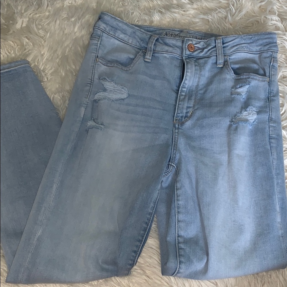 light wash distressed jeans